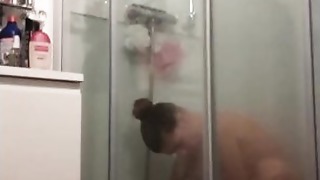 SPY webcam in bathroom red-haired trims and showers
