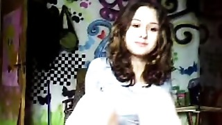 Cute face curly hair timid teenage poses clothed desire to demonstrate more